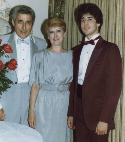 My parents and me during a celebration of their 25th wedding anniversary in June 1984.